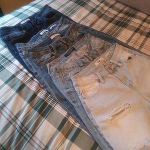 Five Pairs of Jeans with Rips